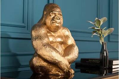 Sculpture design gorille doré