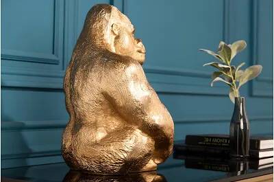 Sculpture design gorille doré