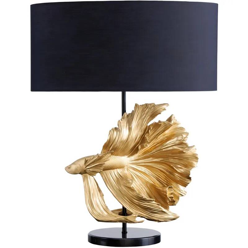 Lampe de table design en aspect marbre noir et résine doré